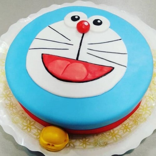 Cheering Doraemon Fondant Cake Delivery in Faridabad