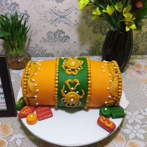 Orange Dhol Shape Fondant Cake in Faridabad