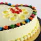 Heart Shaped Butterscotch Gems Cake Delivery in Faridabad