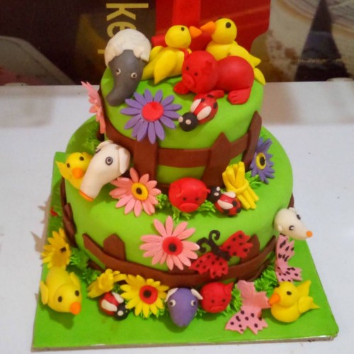 2 Tier Flower Garden and Animal Cake Delivery in Faridabad