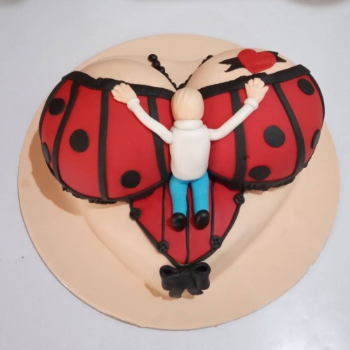 Boy On Boobs Naughty Fondant Cake Delivery in Faridabad