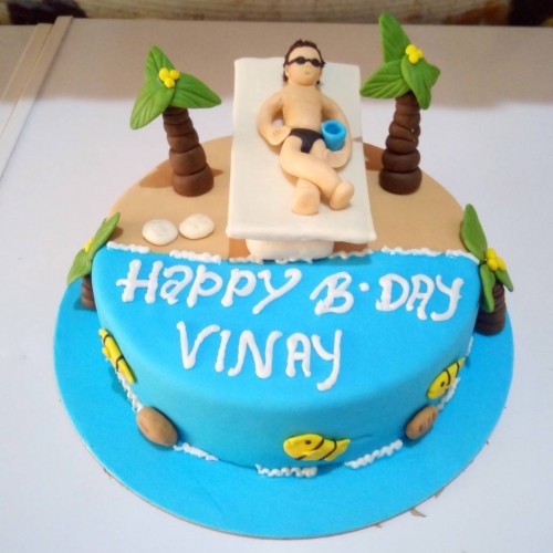 Relaxing on Beach Theme Cake Delivery in Faridabad
