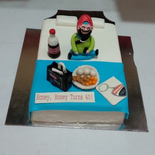 Sardar Ji Sitting on Bed Customized Cake Delivery in Faridabad